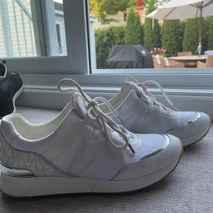 Almost new white Michael Kors sneakers size 8,5. Only wore twice